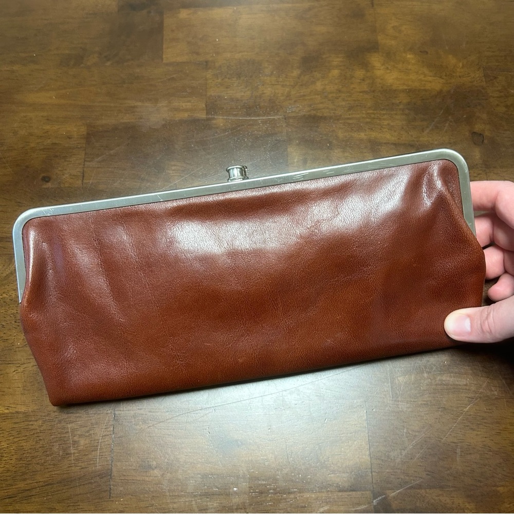 Consuela Tawny Clamshell Clutch Wallet in Brown Leather with Crossbody Strap - Picture 2 of 16